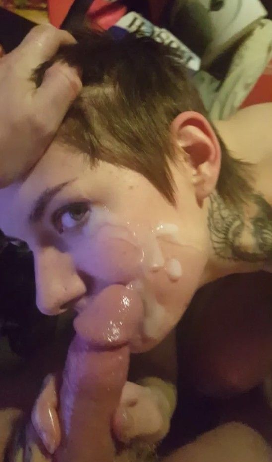 Brunette alt amateur with short hair getting a facial from an average-sized dick