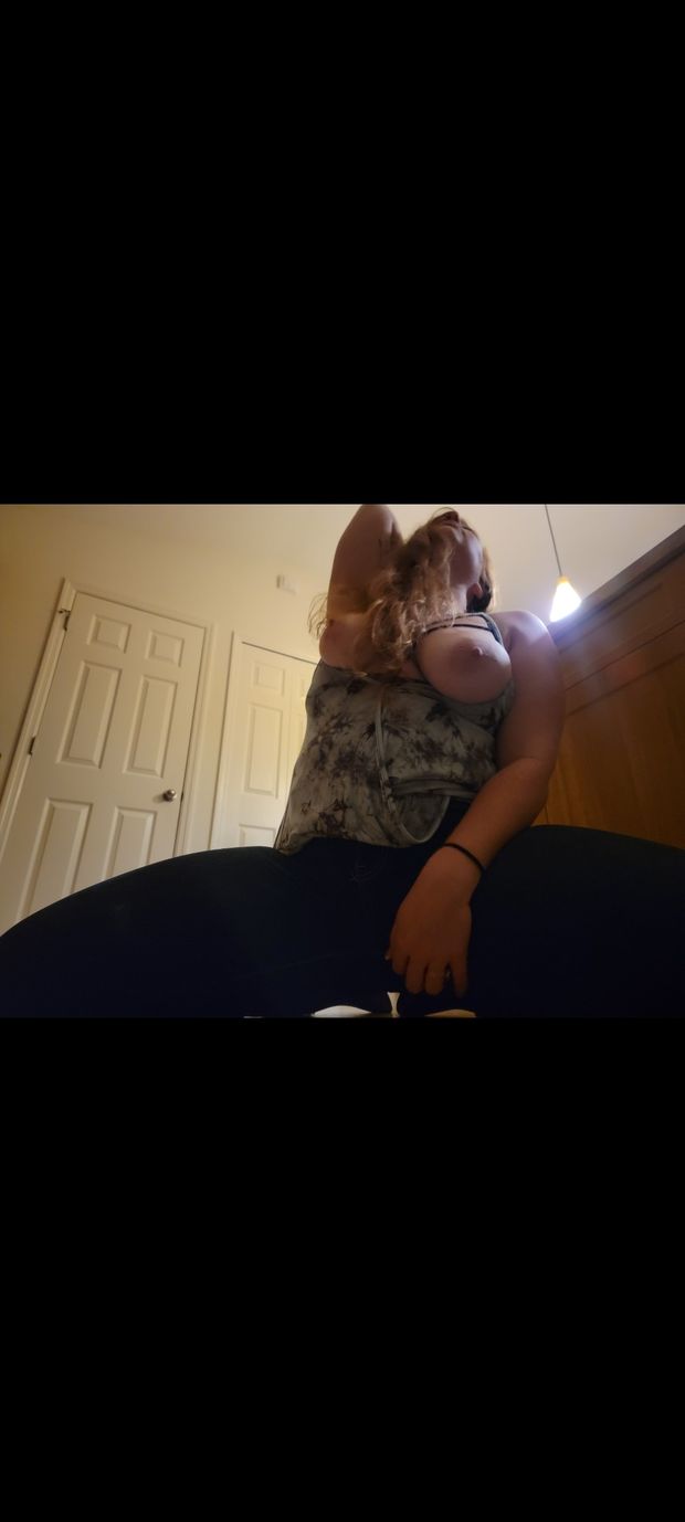 Shy Redhead shows her tits