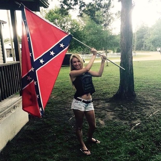 Outdoors holding flag