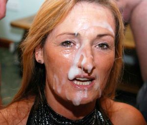 This middle aged wife and mother just took a double facial from her two teen sons!