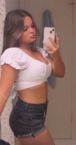 Teen in Jean shorts mirror selfie