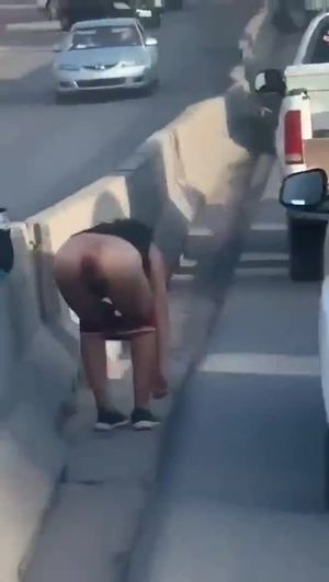 Winking her holes at traffic