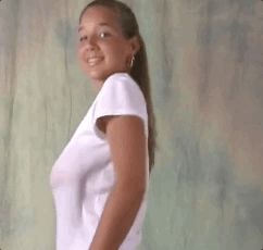 Christina dancing in a wet t-shirt