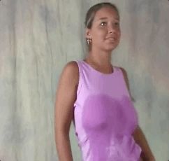 Christina dancing in a wet t-shirt