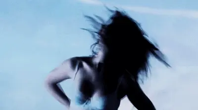 One Day. Taking her bra off.