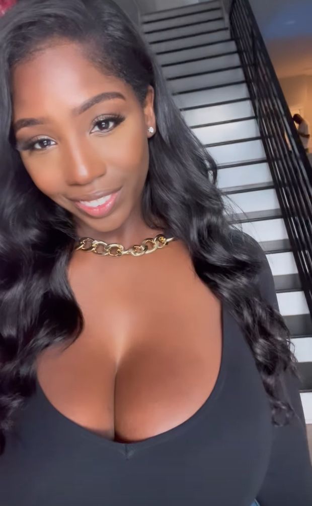 Ellie Mae amazing cleavage in black top