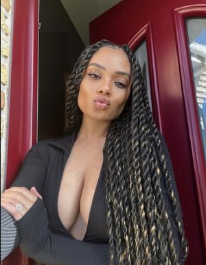 Beautiful ebony queen blowing a kiss