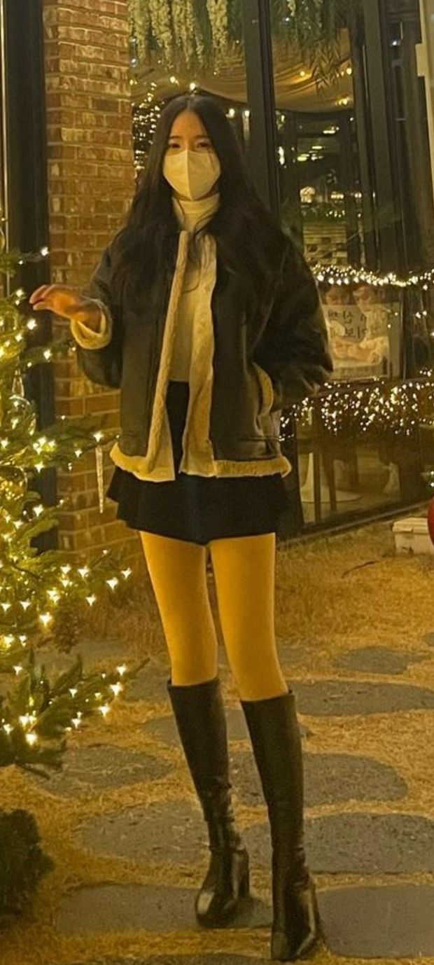 Beautiful korean with boots and skirt