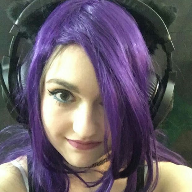 Purple hair woman.