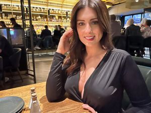 She sits at your table, what do you do?