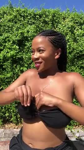 Abby Zeus putting on her bikini