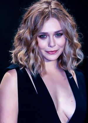 naughty Elizabeth teasing us with a sexy smile