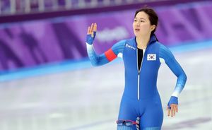 Cute Asian cameltoe on Asian ice skater wearing tight outfit around her hips and fit body