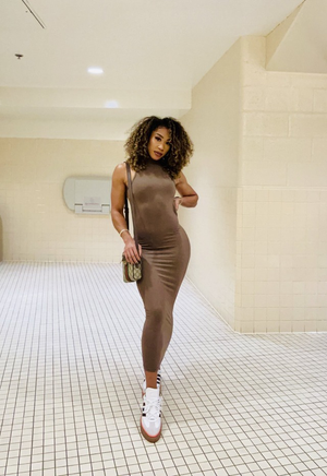 Alycia Baumgardner in a dress