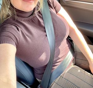 milf with big tits in the car