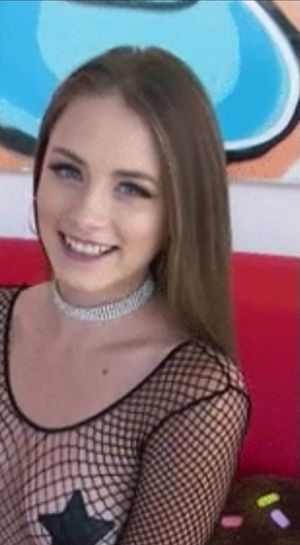 Cute brunette in fishnets