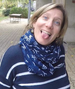 Blue eyed blonde with tongue out! I Love her so much