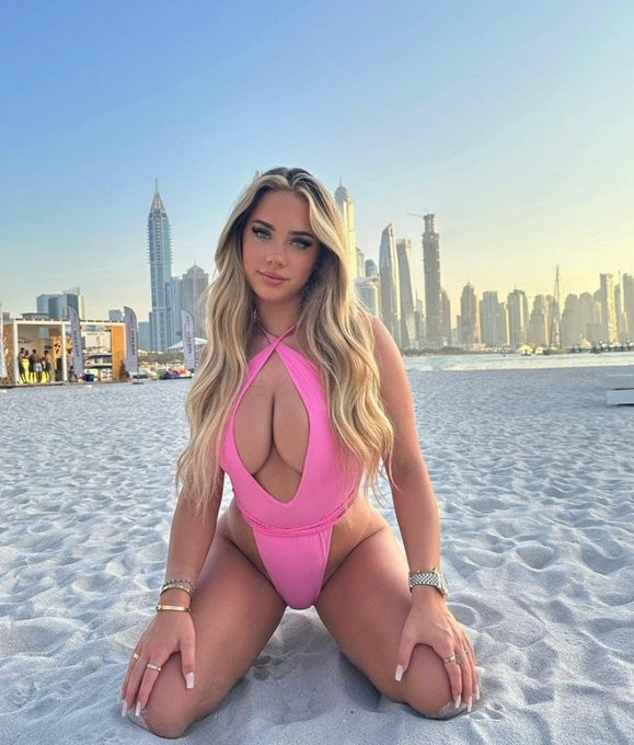 On the beach, absolutely ruining those tits in front of others