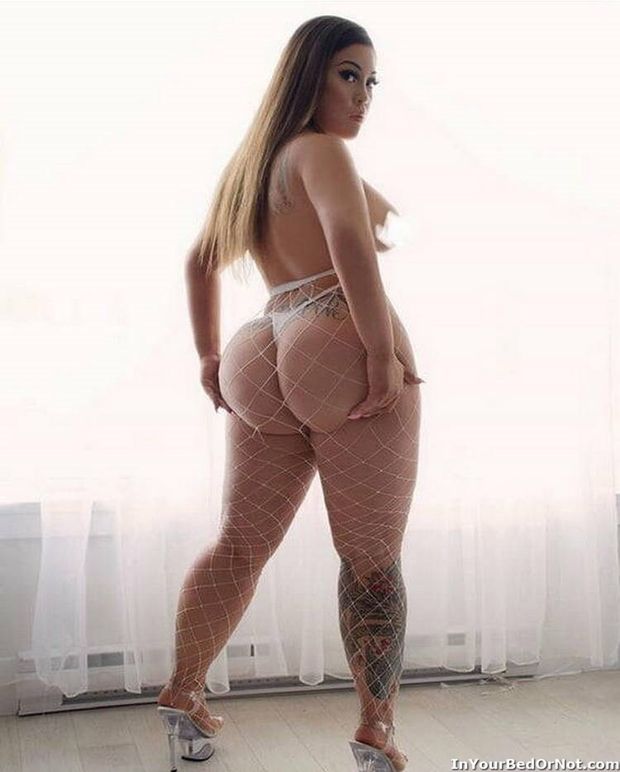 Fat ass in fishnet