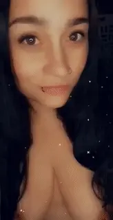 Showing off her new piercings