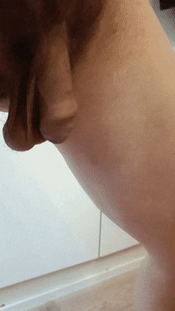 Gif - Guy swinging hes dick and balls and they hit each other