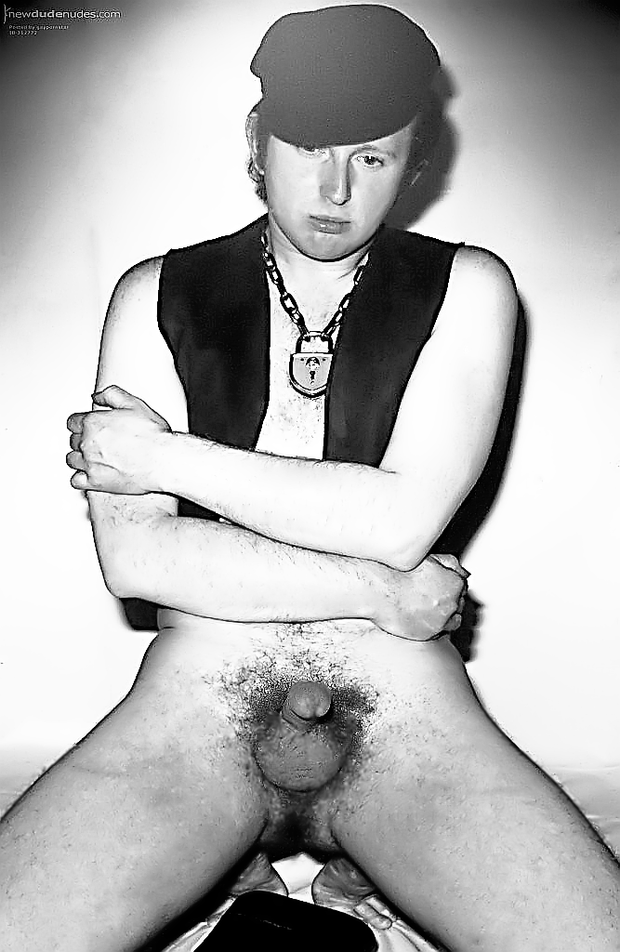 Guy posing naked  with a stiff cock