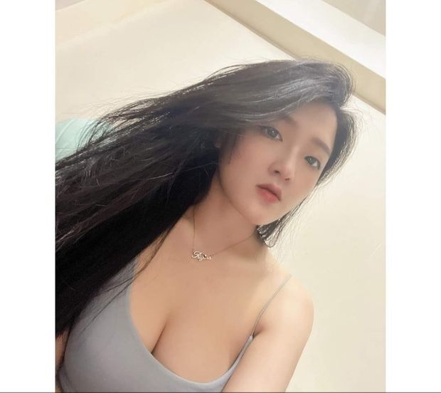 letting the foreign men she meets in nightclubs kiss her nude breasts pays this Taipei fuckdoll's rent