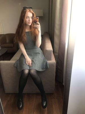 cute redhead in black tights