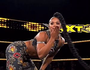 Bianca Belair giving herself a spanking