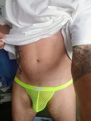 Neon fishnet thong