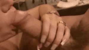 Close-up of Julian's cock being devoured