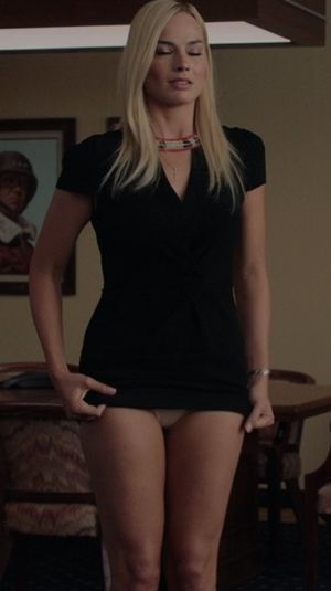 Margot Robbie flashing her panties in “Bombshell”