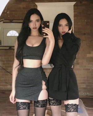 Two amazing babes / bitches take a selfie in stockings