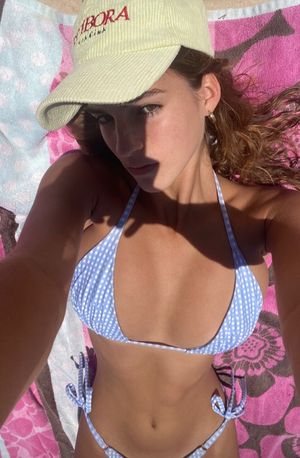 Emily selfie with hat polka dot bikini