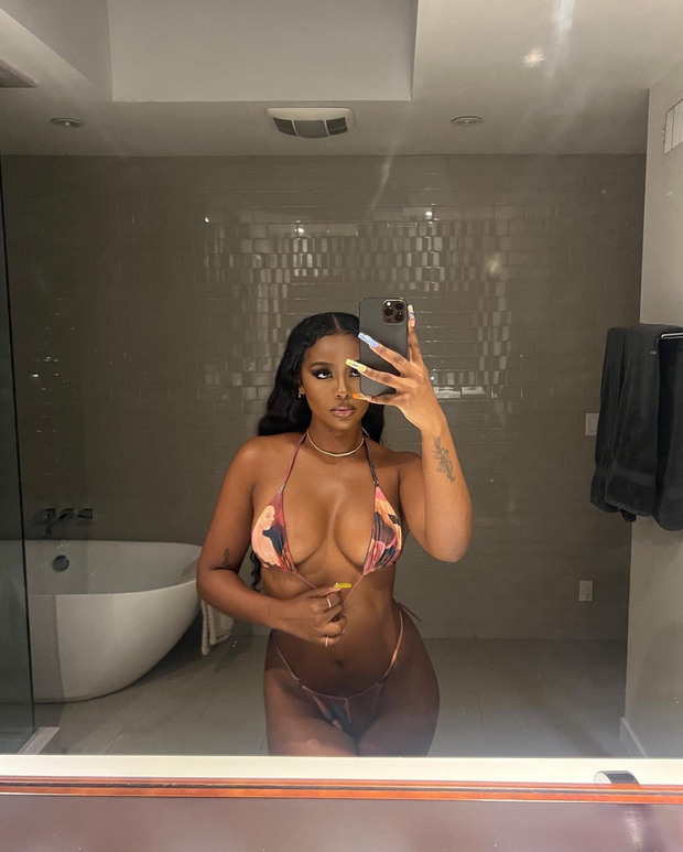 Justine Skye taking a selfie in a bikini