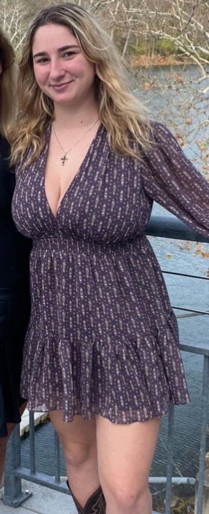 Jolie in dress with cleavage