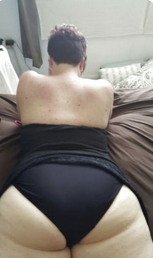 Rear view of an attractive chubby milf x
