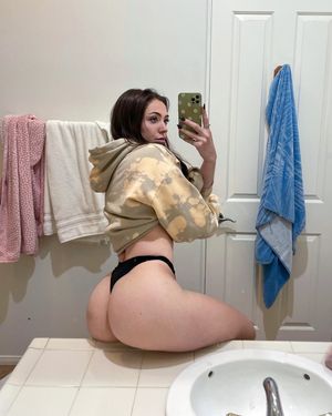Slutty little amateur shows amazing ass in thong