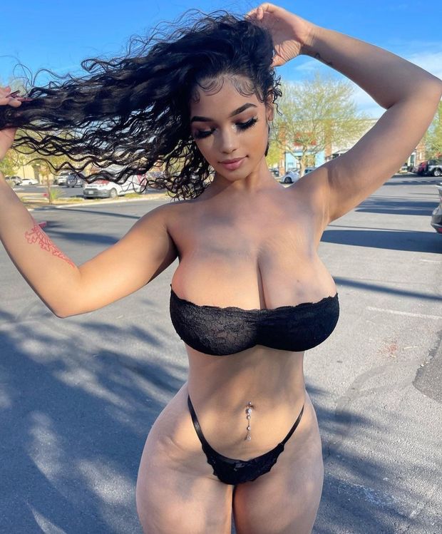 Lexie in black lingerie in the street