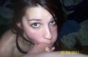 Brunette amateur teen trying to shove as much dick in her mouth as possible