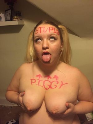 Stupid Piggy has Stupid Written on her forehead