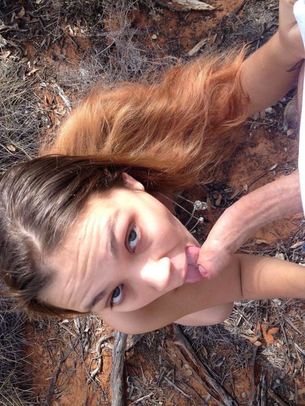 Amateur brunette outdoors sucking a long curved dick
