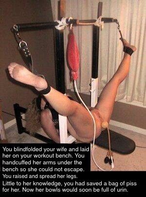 Unaware wife receives piss enema and gets her bowels filled.