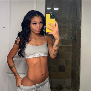 Coi Leray in her sports bra and sweatpants