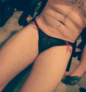 My cock bulge in my wife thong