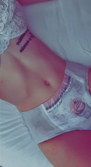 Woman in lace bra and petite diaper