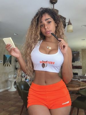Helayna Marie dressed as a Hooters waitress