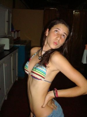 Sexy lil slender Spic posing in a bikini