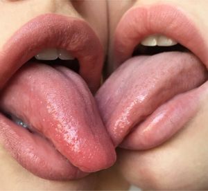 Elly and my mum swapping spit tongue kissing