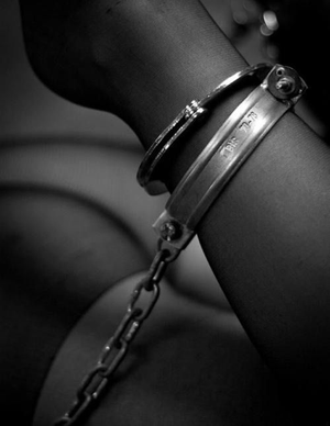 Hot: cuffs & shackles over nylons.